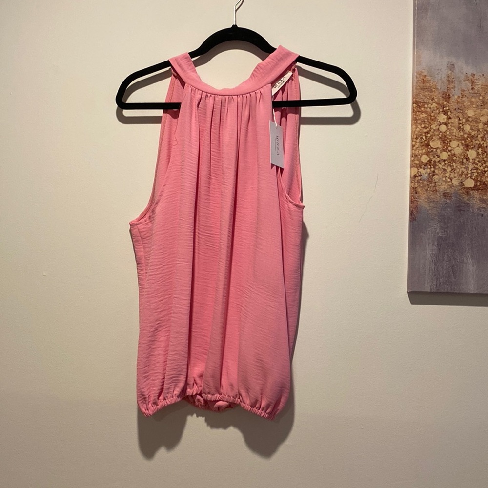 Shirt with bow tie on left shoulder, can be tied in back